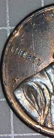 The-LMC-Penny1998-Has-A-Longest-Die-Crack-From-The-Os-To-Rs.-Will-It-Break?