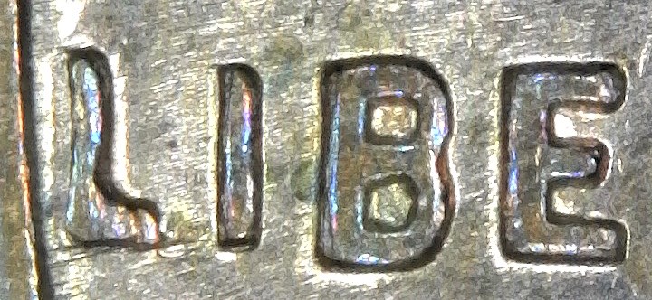 1961-D-LMC.-Interesting-Coin/1961-D-1MM-012-And-1961-D-1�-WWHO-002