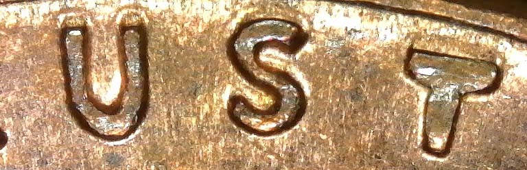 1961-D-LMC.-Interesting-Coin/1961-D-1MM-012-And-1961-D-1�-WWHO-002
