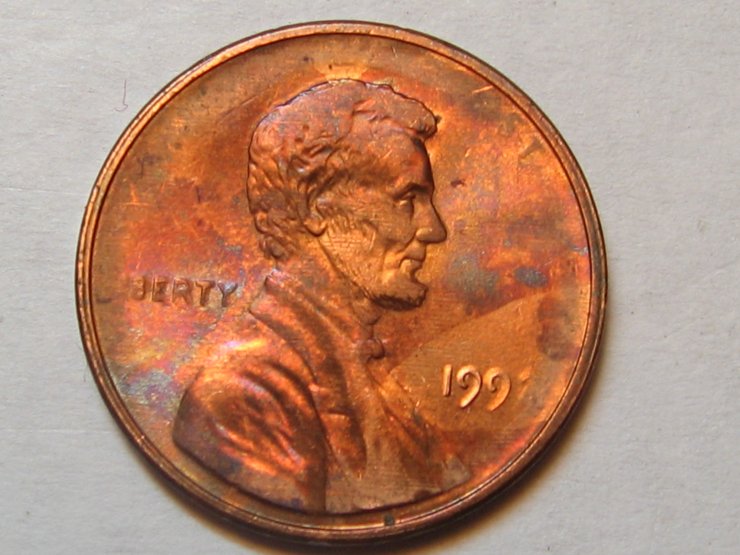 What-Causes-These-Lines-To-Form-On-A-Coin?-And-Why-Do-They-Show-Up-Kinda-Black-To-The-Naked-Eye?