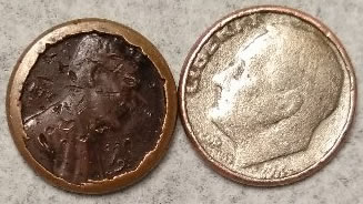 Lincoln-Penny-Size-Of-Dime-Plus-Other-Error--Strange?