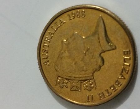 Sharp-Edges-On-$1-Coin.
