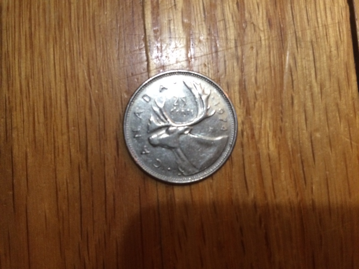 Are-Any-Of-These-3-1974-Twenty-Five-Cents-Worth-Keeping?