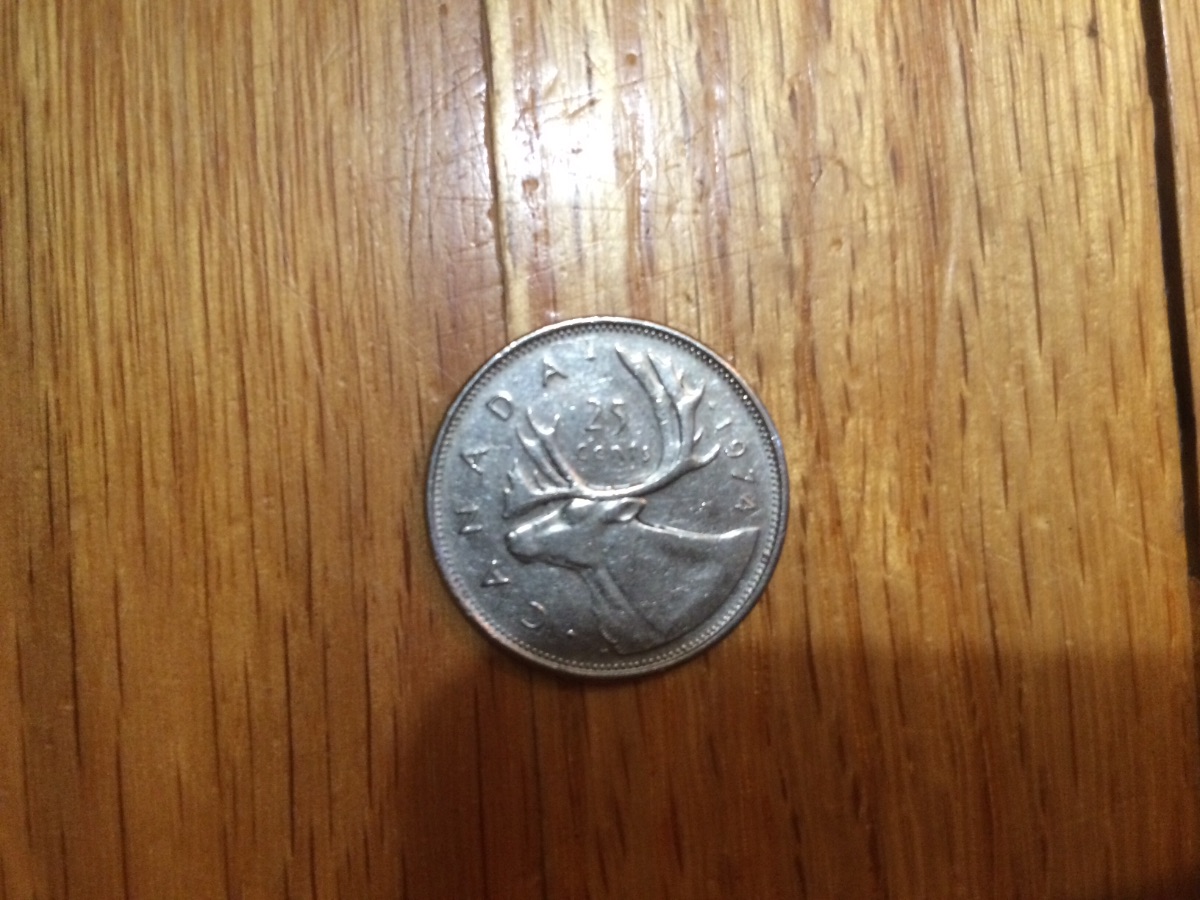 Are-Any-Of-These-3-1974-Twenty-Five-Cents-Worth-Keeping?