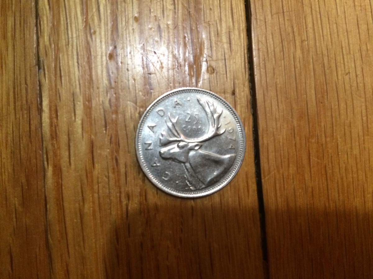 Are-Any-Of-These-3-1974-Twenty-Five-Cents-Worth-Keeping?