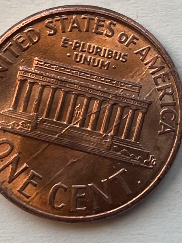 1989-Penny-With-Two-Large-Cracks---I-Don't-Know-Anything