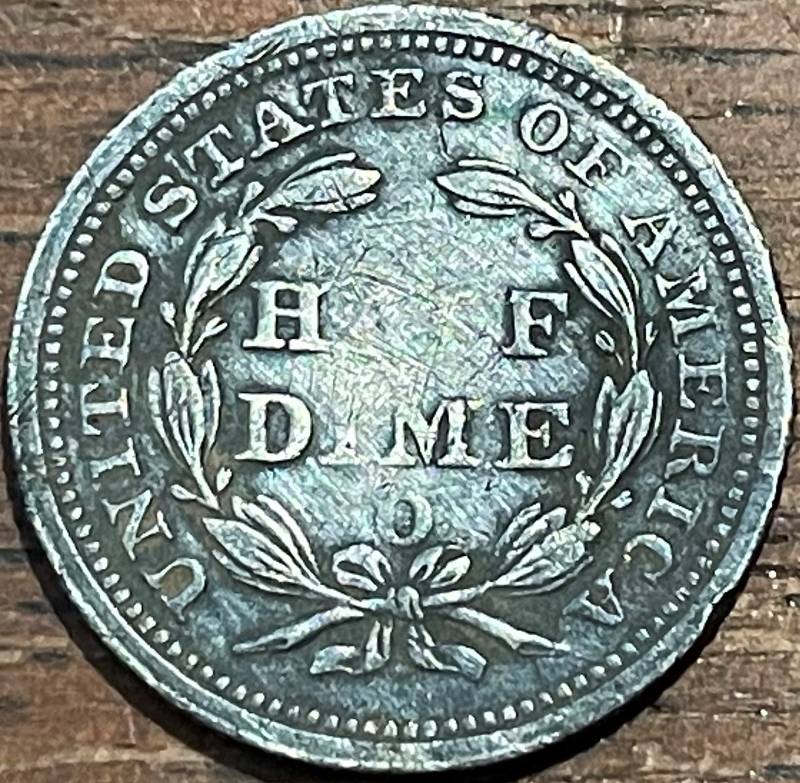1848-Half-Dime,-Medium-Print-With-What-Looks-Like-Wear-On-The-A,-L,-And-I-On-The-Back.