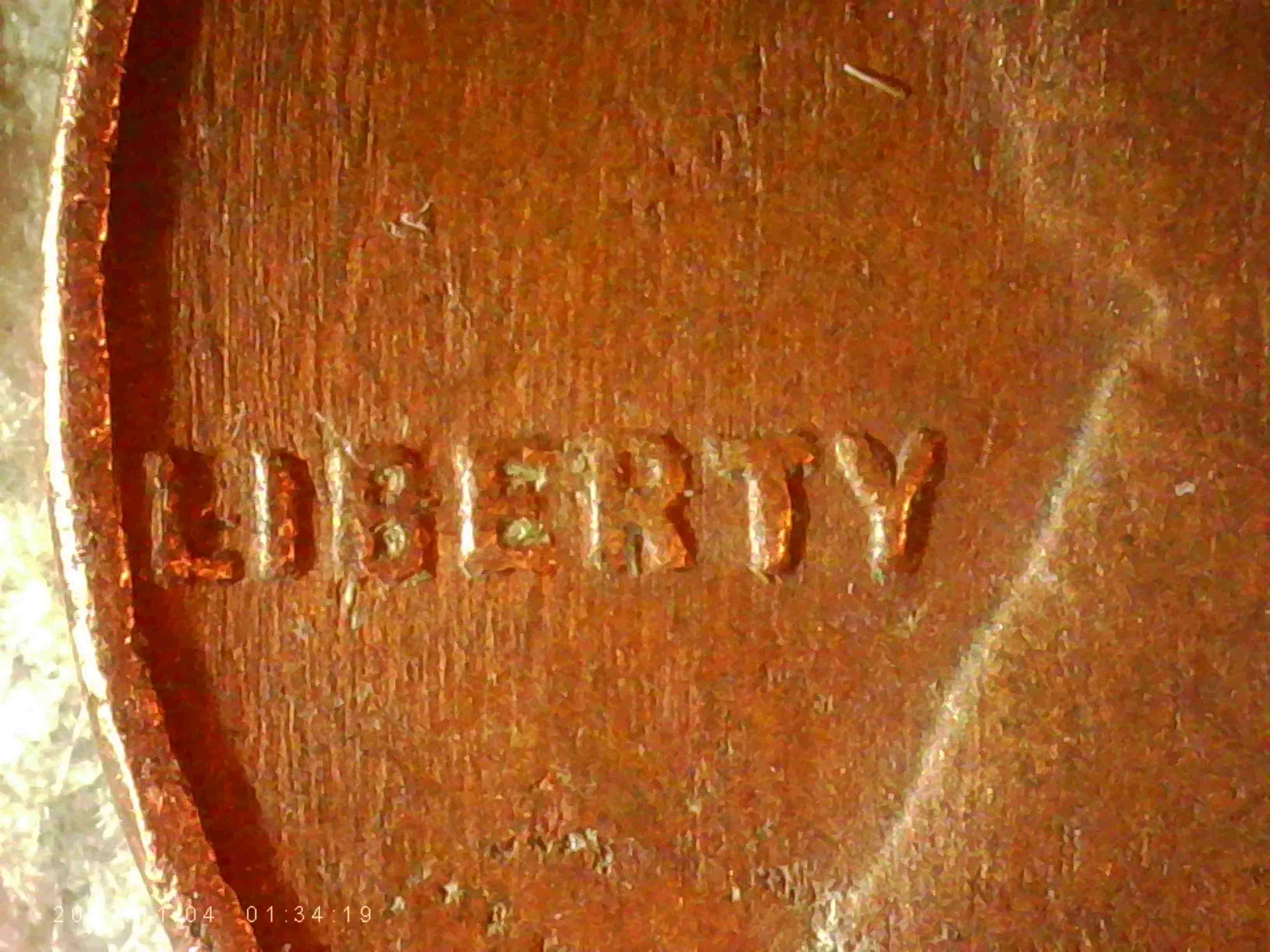 1948-LWC.-What-Causes-All-These--Diagonal--Lines-On-This-Coin?-Thanks-Bentpenny