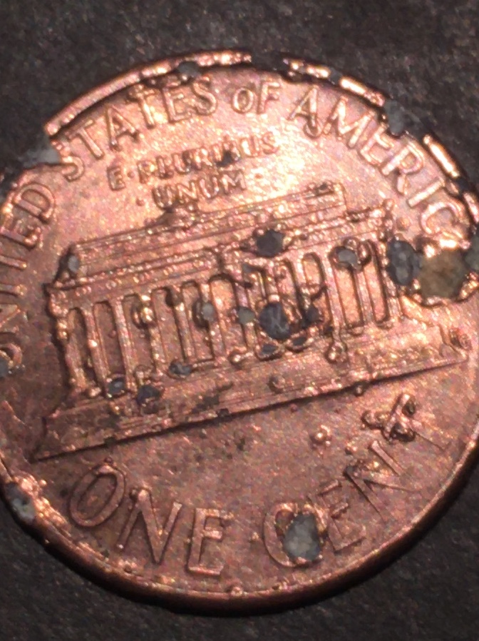 Damaged--1992-Lincoln-Penny-W/-Halo-On-Foot-Of-The-A-Connecting-The-M?