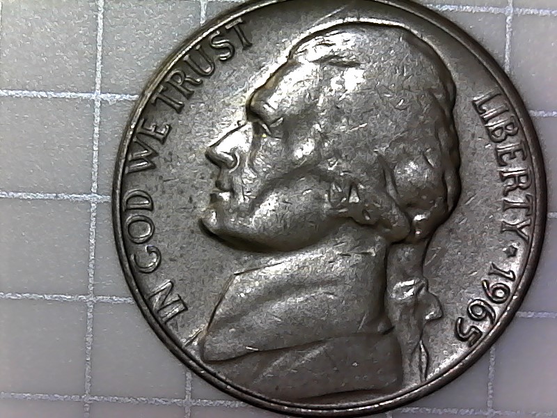 1965-Jefferson-Nickel-With-Floating-Head-And-Reverse-Missing-Letters