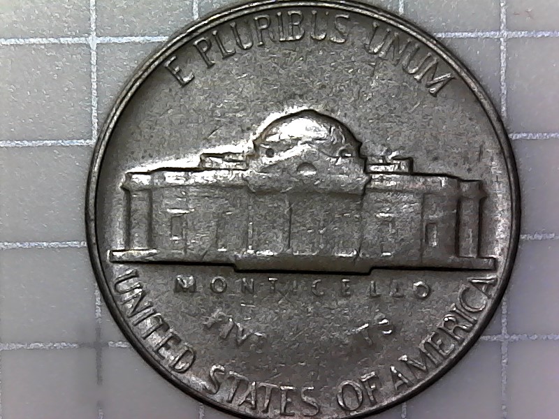1965-Jefferson-Nickel-With-Floating-Head-And-Reverse-Missing-Letters