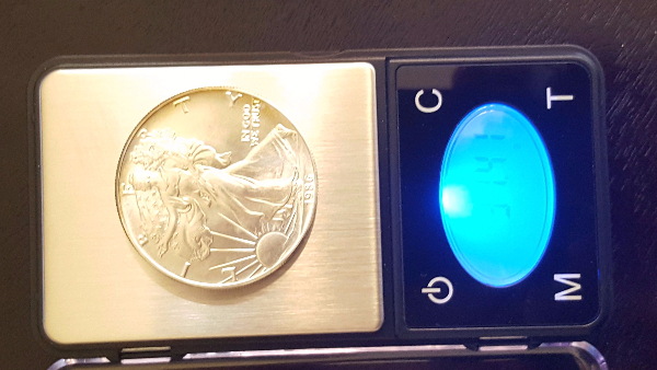 1986-American-Silver-Eagle-Weighing-31.41g-Versus-31.1g