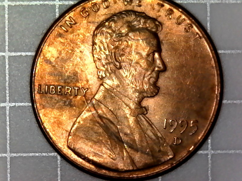 1995-D-Cent-With-Two-Raise-Areas-On-Lower-Jacket-And-Upside-Down-