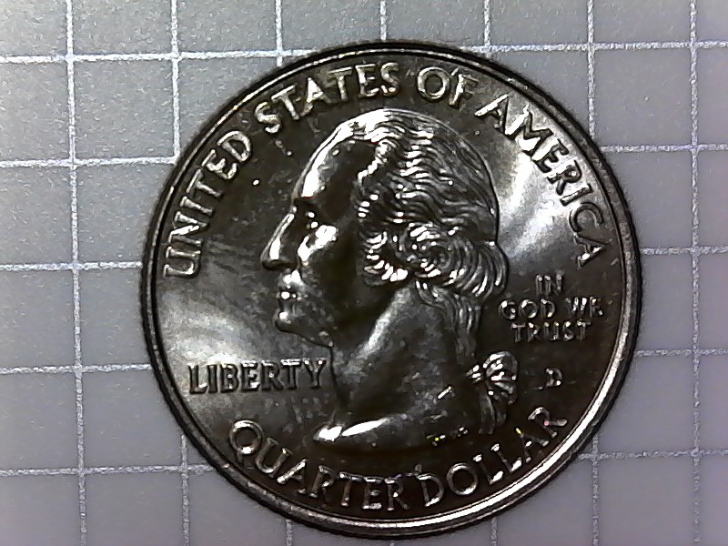 2009-D-Quarter-With-Metal-Flakes-On-L-And-I-In-Ellington