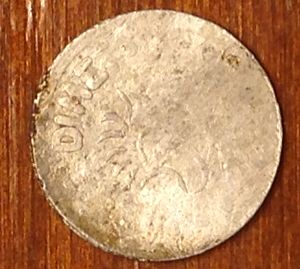 Strange-Dime-Sized-Coin--Play-Money?