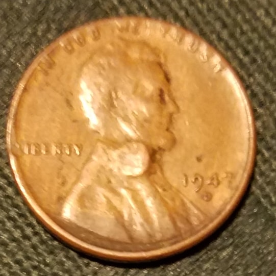 1947-Lincoln-Penny-With-Perfect-Circle-On-Back