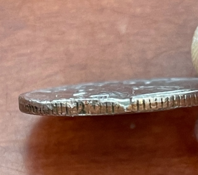 1965-Quarter-Strike-Through-Or-PMD?