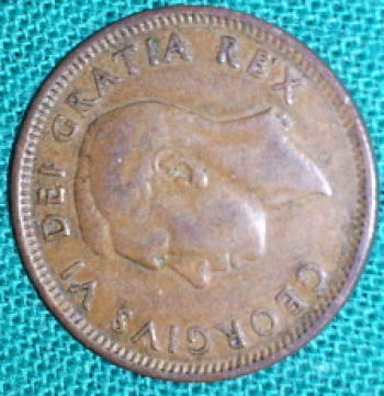 1949-Cent-With-A-Pointing-To-Denticles