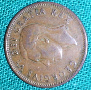 1949-Cent-With-A-Pointing-To-Denticles