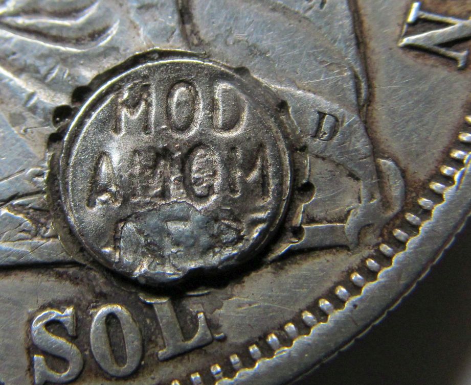 1865-Peru-Un-Sol-With-Unusual-Alteration