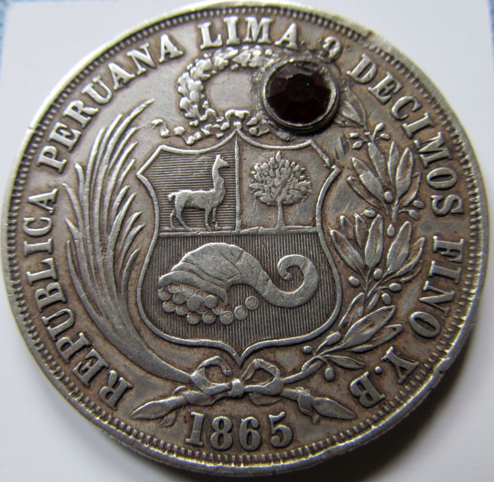 1865-Peru-Un-Sol-With-Unusual-Alteration