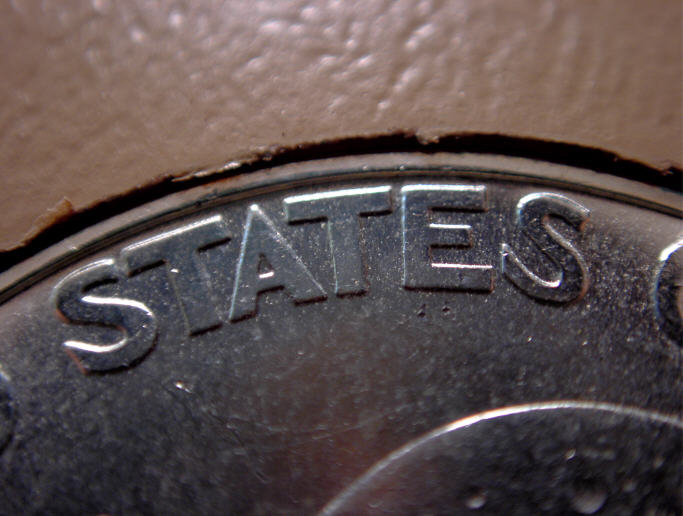 Difference-Between-1976-Type-1-And-Type-2-Ike-Dollars