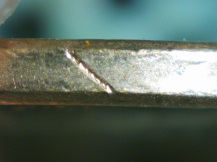 2015-P-Lincoln-Cent-Struck-Through-Wire-Or-Metal-Scraps?--X's-3-Or-4
