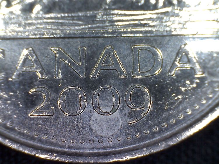 2009-Nickel-With-Circle-Below-2nd-0-Grease-Or-?