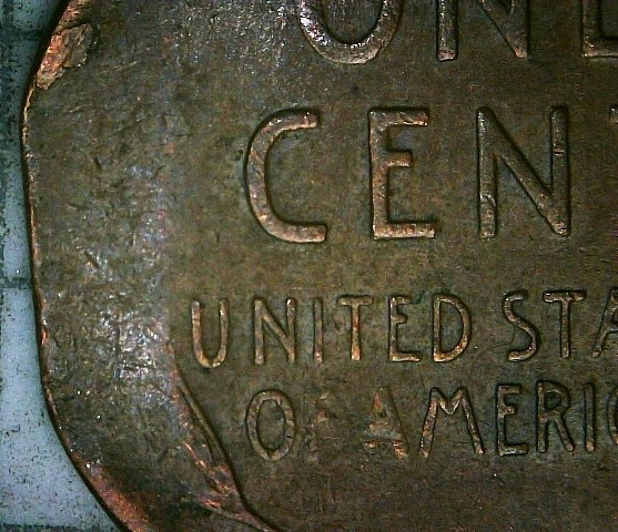 1955-P-Cent-With-A-Straight-Clip-And-Struck-On-A-Tapered-Blank