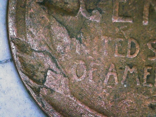 1923-P-Penny-Delamination-Or-Strike-Through?