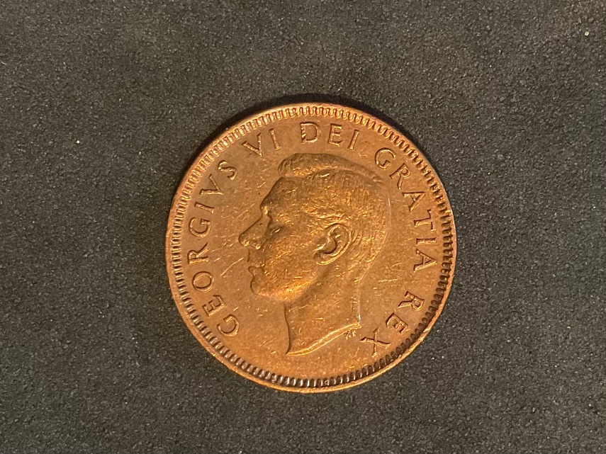 1952-Canadian-Penny-Cud,-Crack-Or-Post-Mint-Damage?