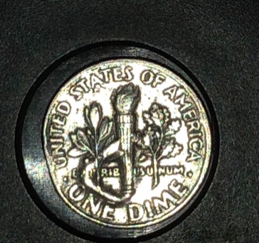 Not-Sure-If-It-Worth-Anything-But-It's-An-Odd-Looking-Dime