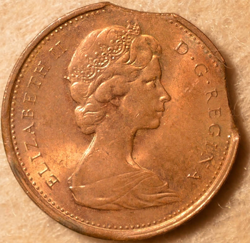 1975-Penny-.-Double-Clip-?