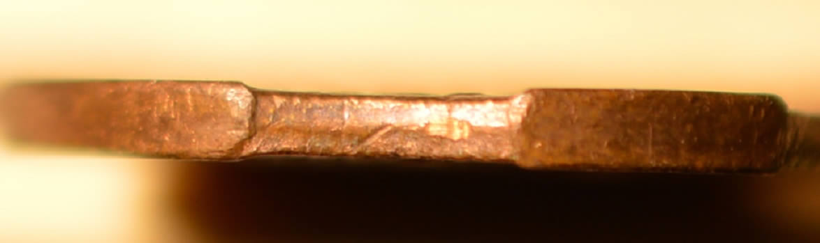 1975-Penny-.-Double-Clip-?