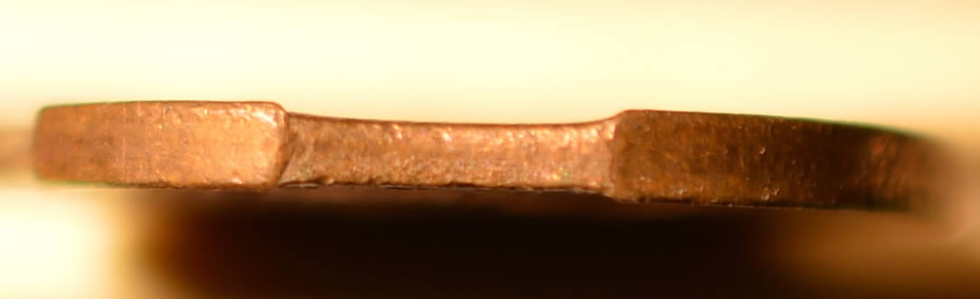1975-Penny-.-Double-Clip-?