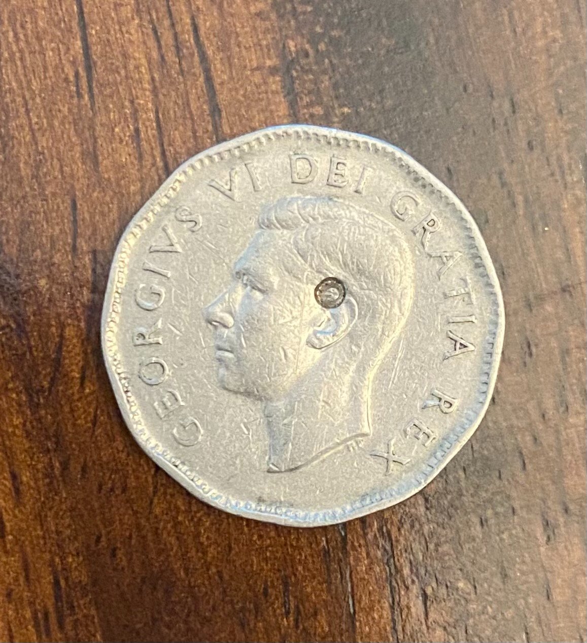 1949-Canadian-Nickel-With-A-Punch?-In-It