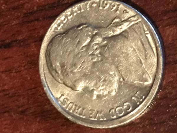 Weird-1991-P-Nickel-Error.-One-Edge-Is-Way-Thicker-Than-The-Other