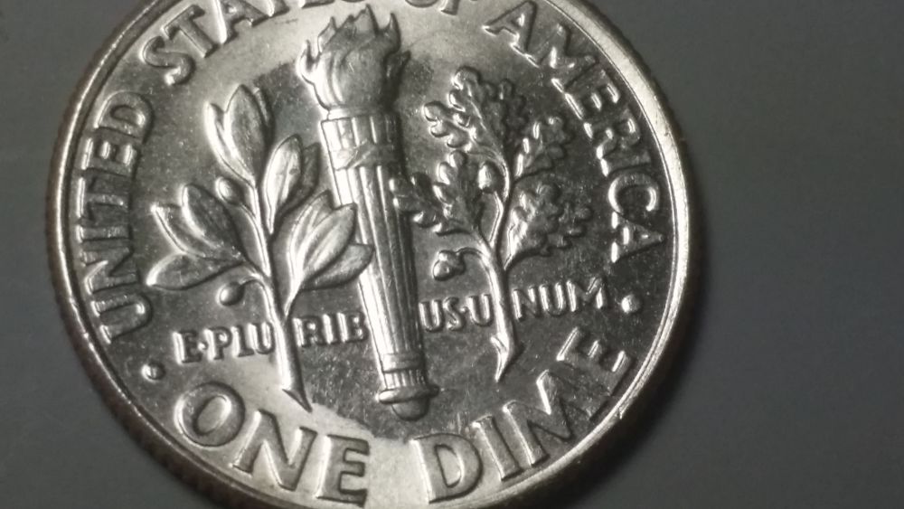 2007-Unusual-Dime..-Ghosting?-Lamination?-Clash?-Grease?