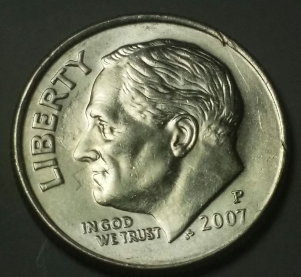 2007-Unusual-Dime..-Ghosting?-Lamination?-Clash?-Grease?