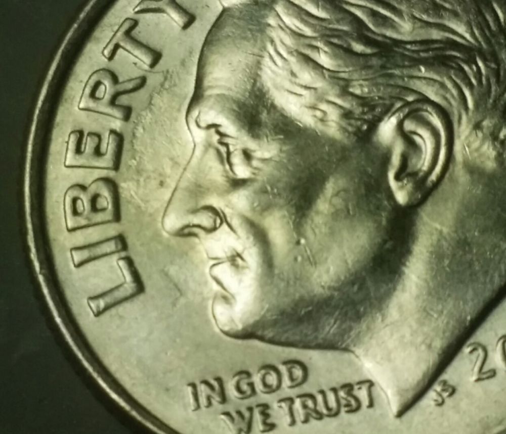 2007-Unusual-Dime..-Ghosting?-Lamination?-Clash?-Grease?