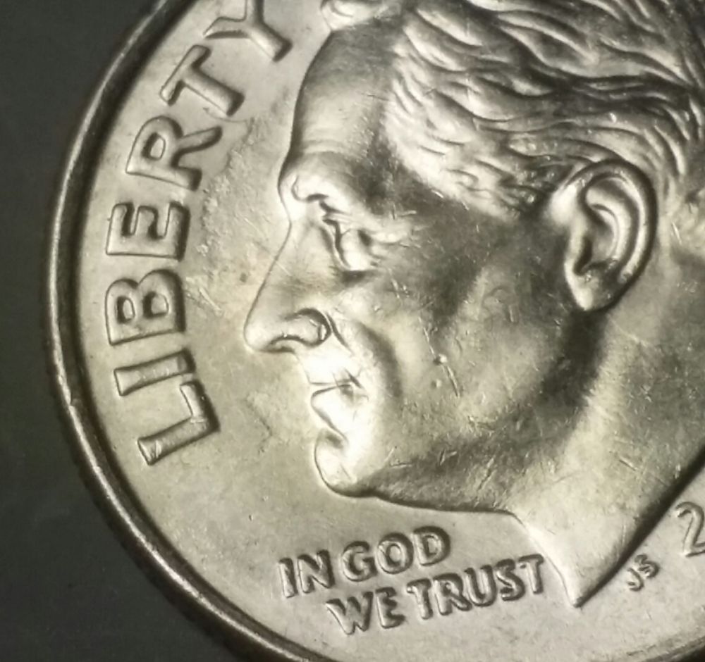 2007-Unusual-Dime..-Ghosting?-Lamination?-Clash?-Grease?