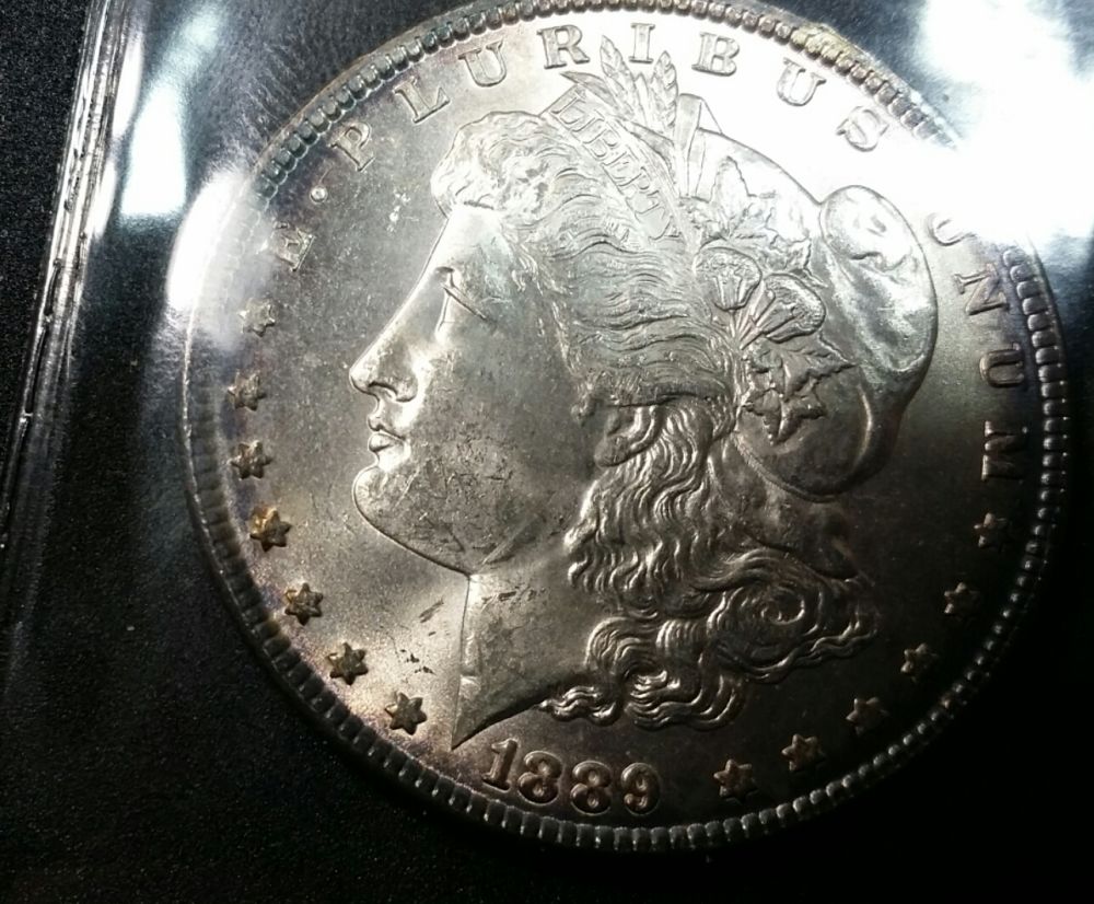 2-Morgan-Dollars-In-Old-Iga-