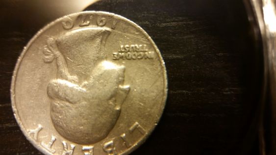 1970-US-Quarter-With-Numbers-Next-To-Date-And-Un-Close