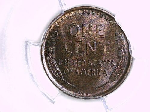 At-Vs-Nt-On-Coins-And-Medals