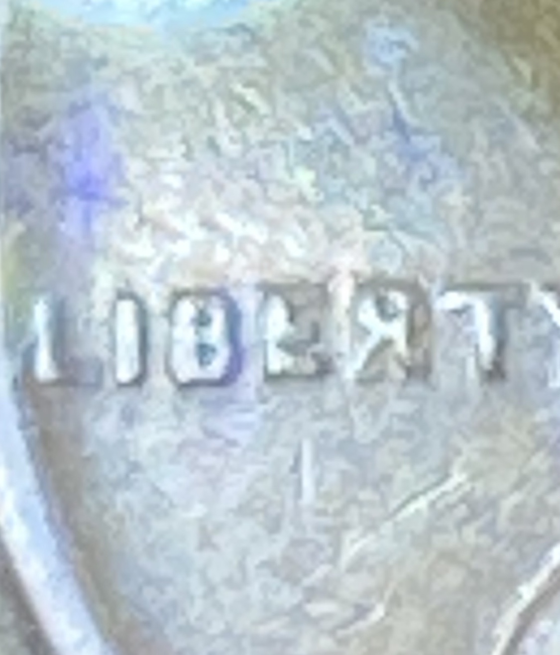 1934-Wheat-Penny-Error.--R-In-Liberty-Is-Backwards