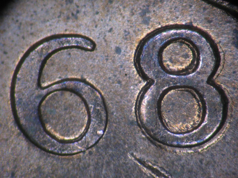1968-Doubled-8-/-1-Cent-Also-Struck-Through-Wires