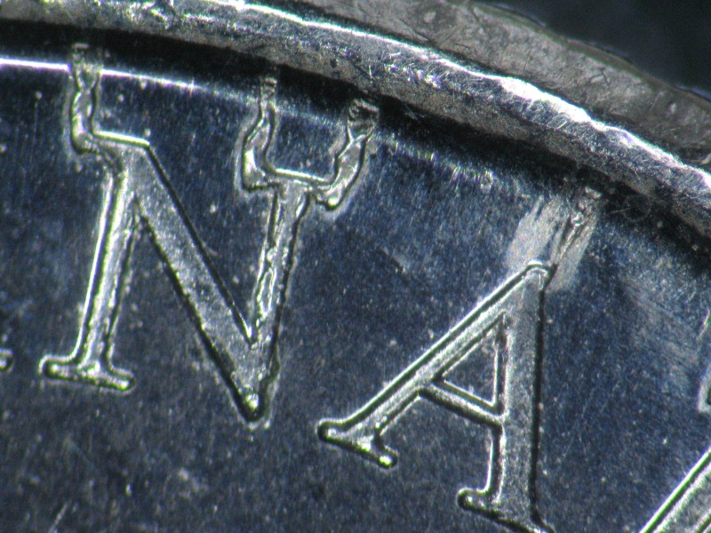 2001-Volunteer-10-Cent-/-End-Of-Its-Die-Life-Obverse-With-Claws-And-Horns