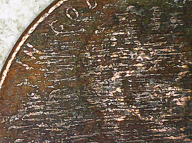 1945-Penny-Possible-Error-With-Planchet.-Features-Visible-Through-Lines-Across-Front-And-Back