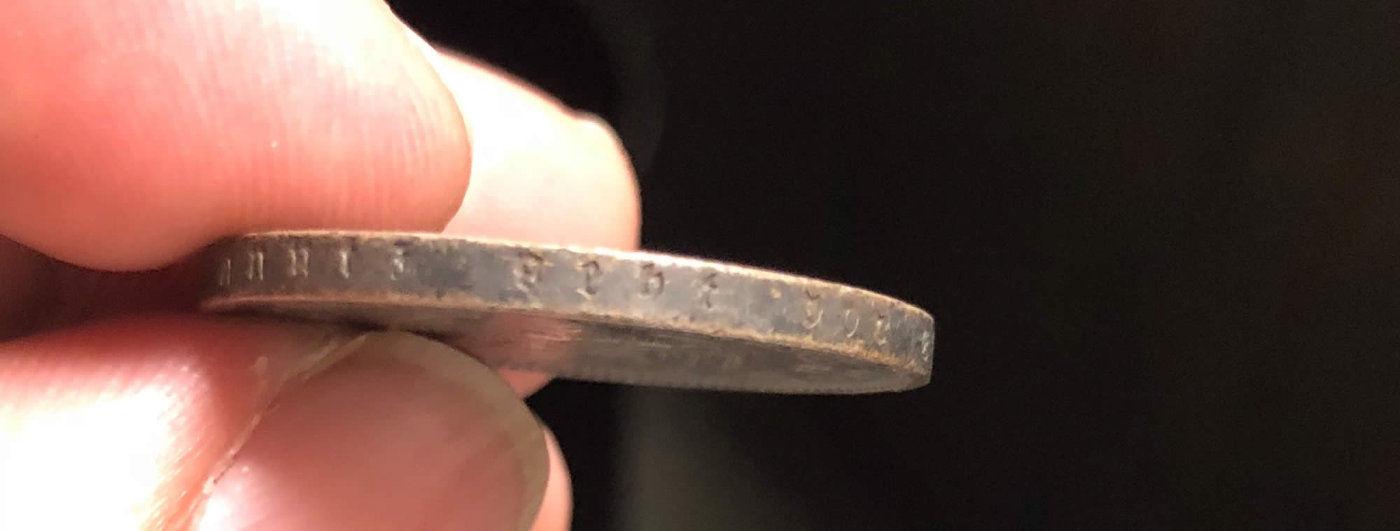 1935-German-Coin-With-Symbols-Around-The-Edge.