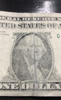 2013-Dollar-Bill.-Washed-/-Worn-Or-Printing-Error